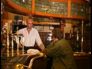 "The Man" talks about his past to "The Barman".